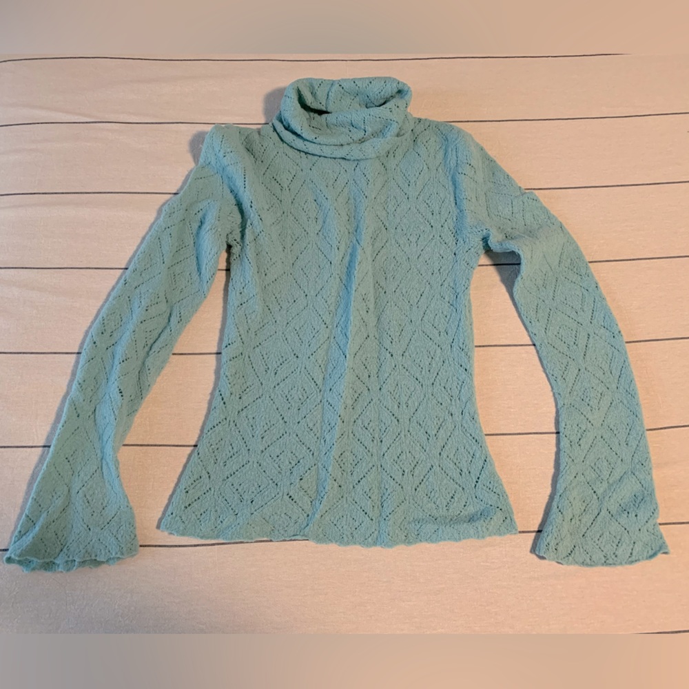 Bell sleeve turtleneck sweater